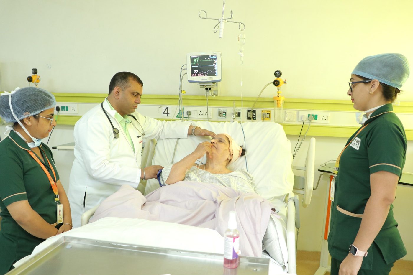 Nursing team attending a patient